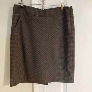 The limited size 10 dark academia brown plaid skirt with pockets. 22” lo…